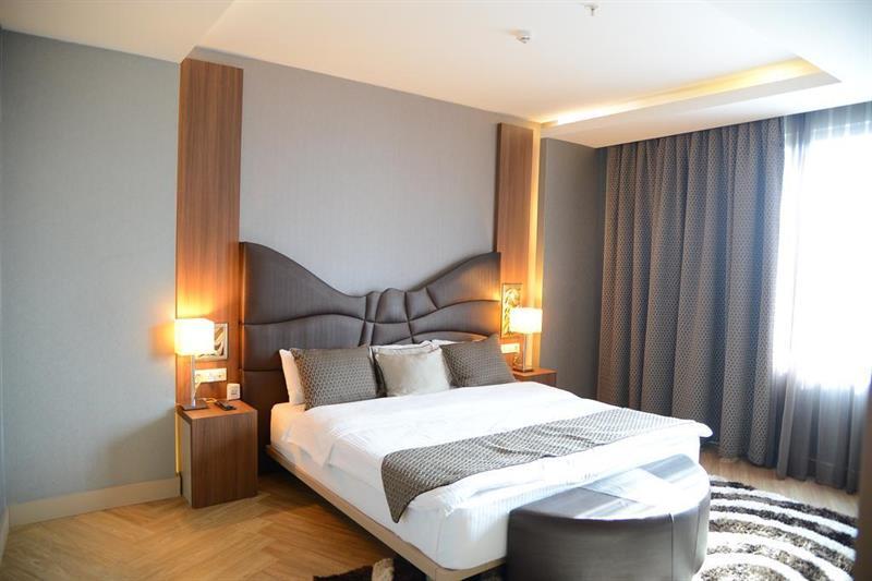 Titanic Hotel & Spa Sulaymaniyah Экстерьер фото A bedroom at the hotel